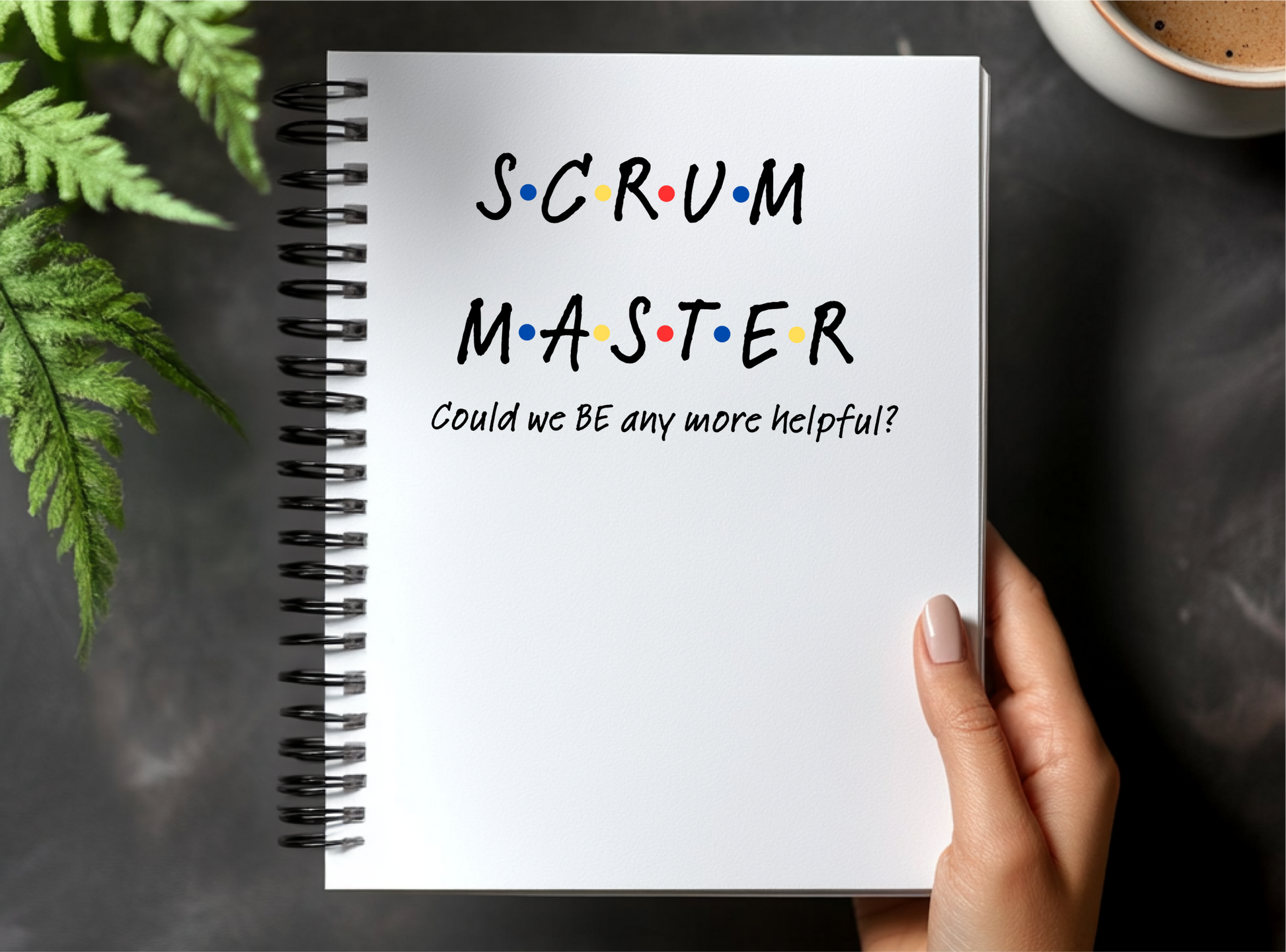 a person holding a notebook with the words scrum master written on it