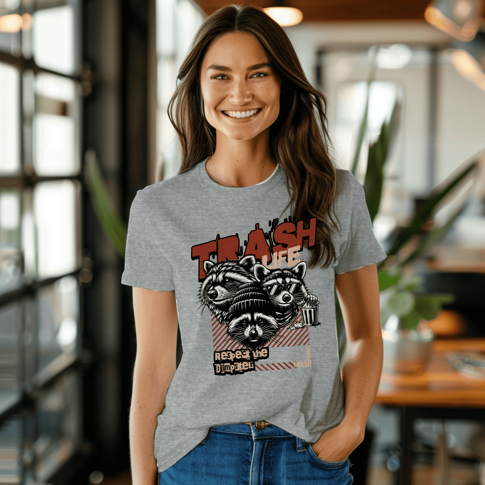 a woman wearing a t - shirt with a raccoon on it