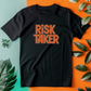 a black t - shirt with the words risk taker printed on it