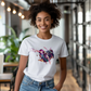 a woman wearing a white t - shirt with a picture of a cat on it