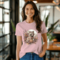 a woman wearing a pink shirt with a raccoon on it