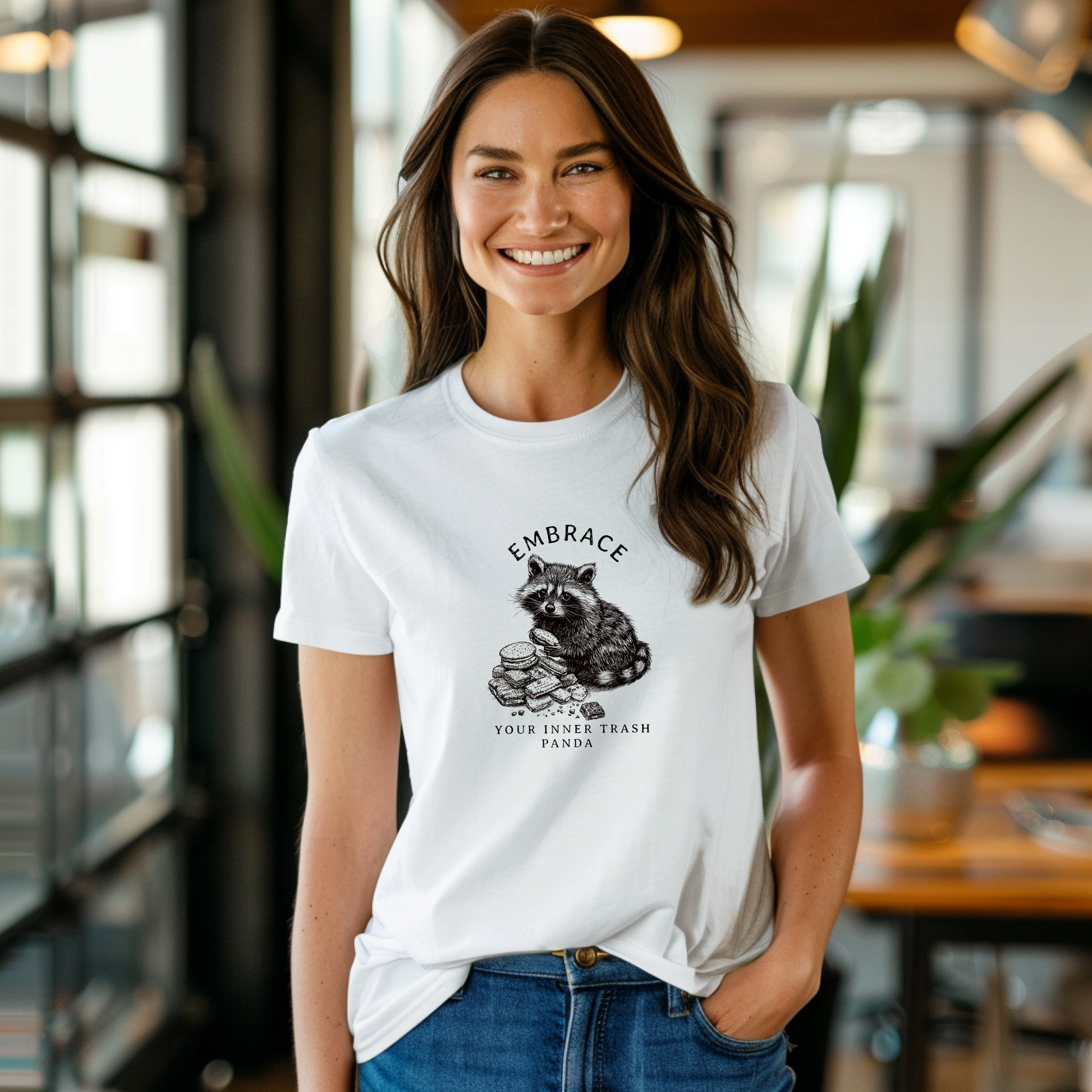 a woman wearing a white t - shirt with a koala on it