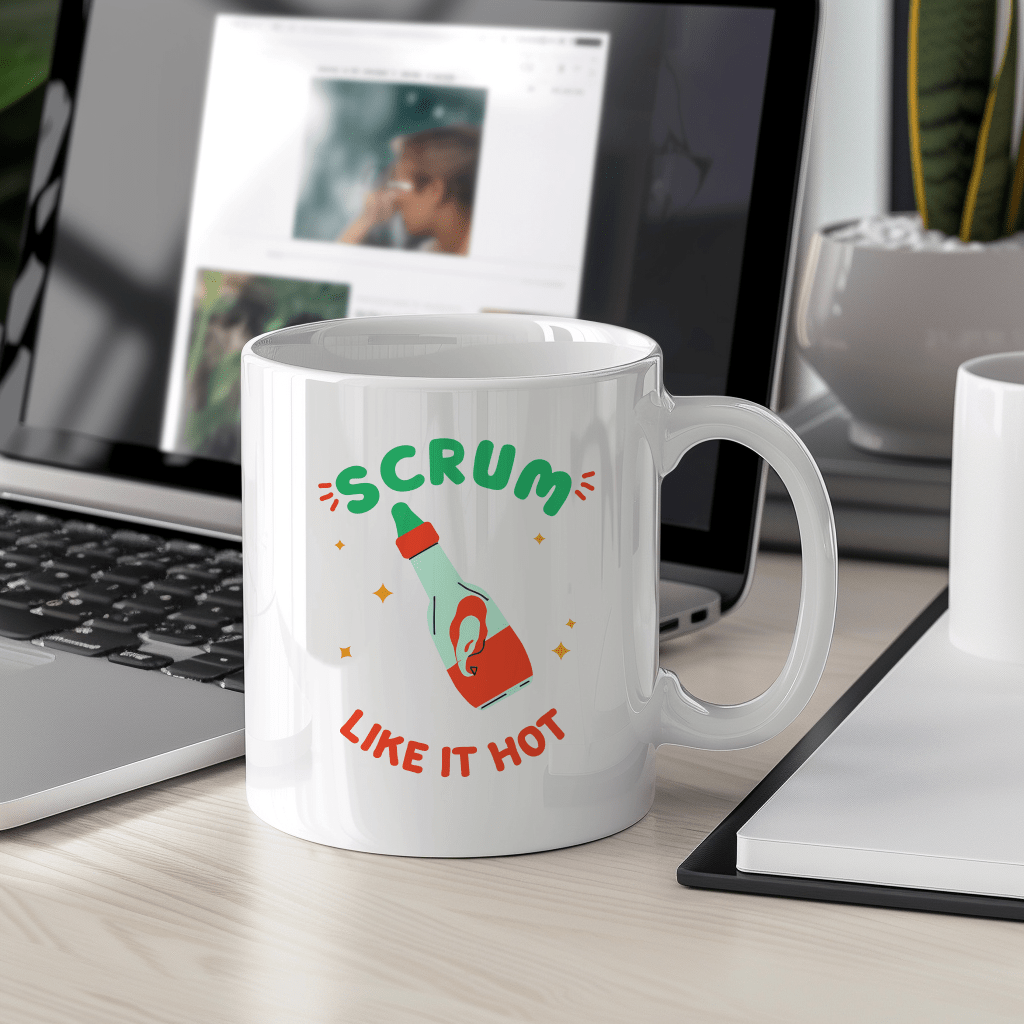 a coffee mug sitting on a desk next to a laptop