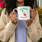 a woman holding up a coffee mug with the words scrum like it hot