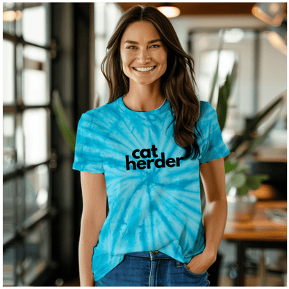 a woman wearing a catherder shirt standing in a room