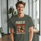 a man wearing a t - shirt with a picture of a raccoon on