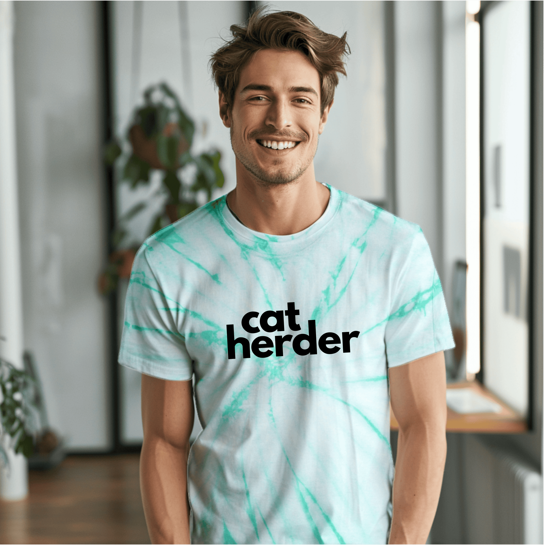 a man wearing a catherder t - shirt in a living room