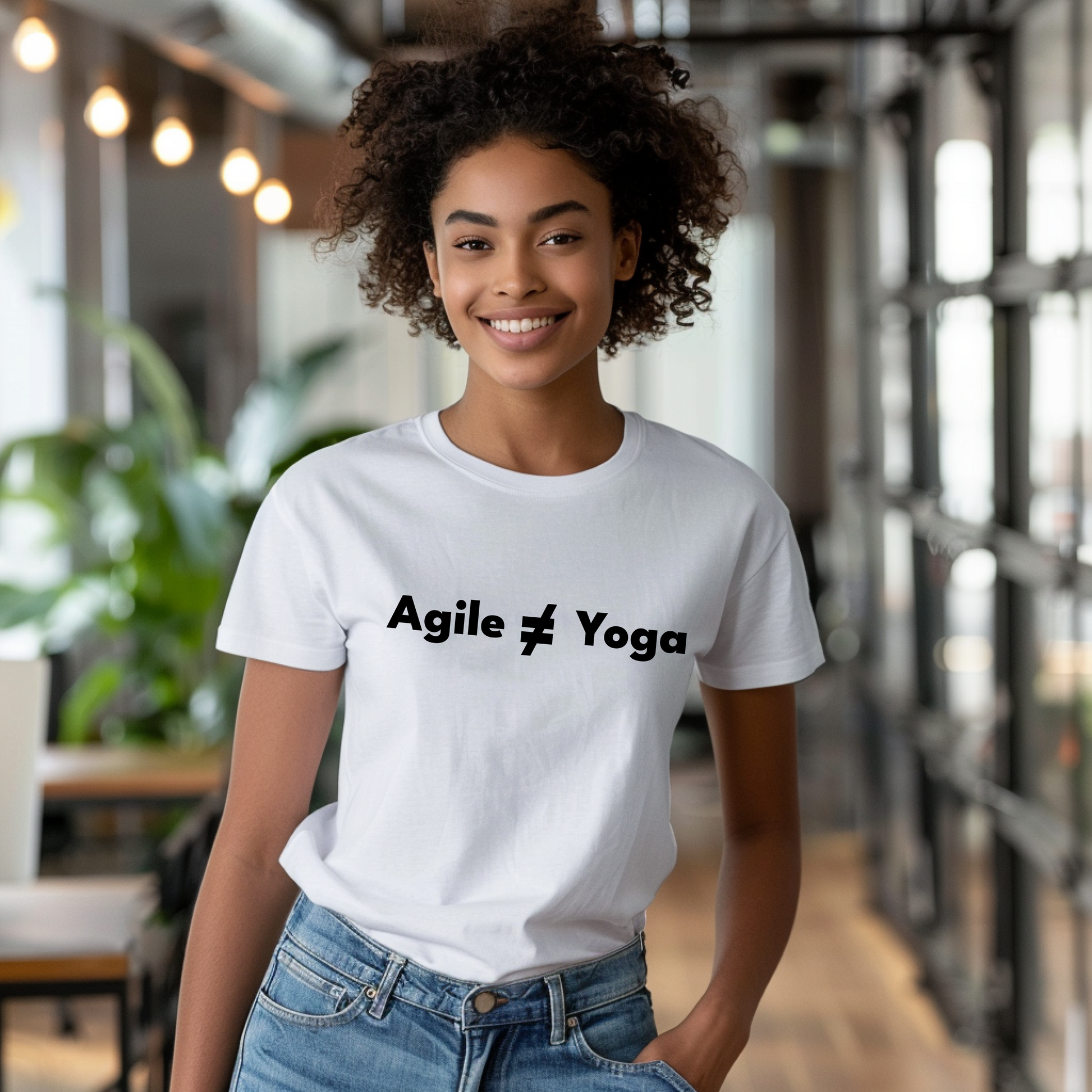 a woman wearing a t - shirt that says agilef yoga