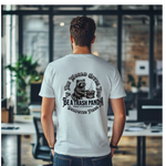 a man standing in an office looking at a desk