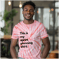 a man wearing a pink tie dye shirt with the words'this is my sprint