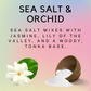 a picture of sea salt and orchid on a pink and blue background