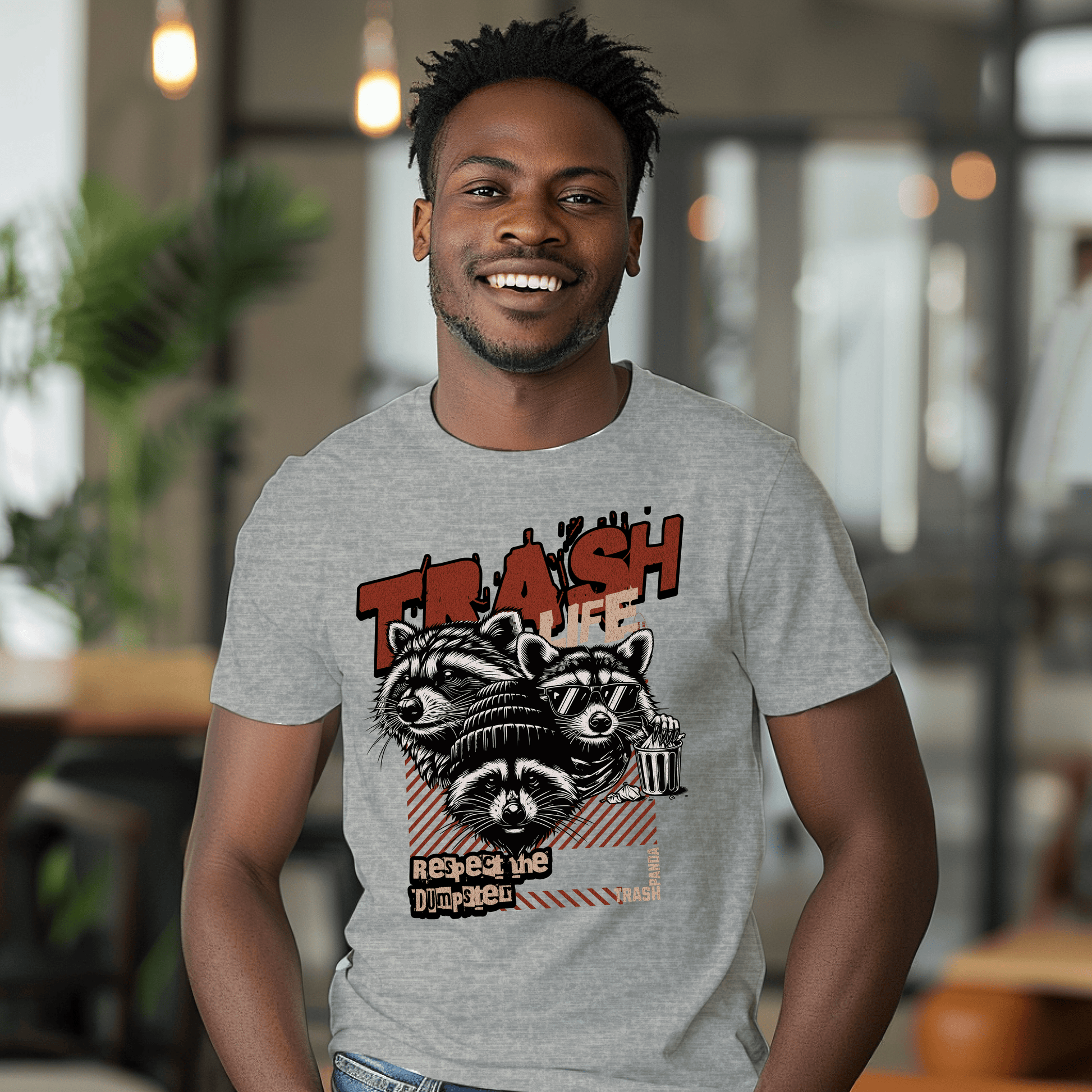 a man in a t - shirt with a raccoon on it