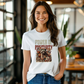 a woman wearing a white t - shirt with a picture of a group of people