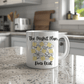 a white coffee mug sitting on top of a counter