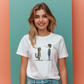 a woman wearing a t - shirt with a picture of a cat and a dog