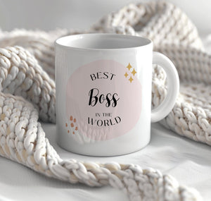 a white coffee mug with the words best boss in the world on it