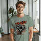 a man wearing a t - shirt with a raccoon on it