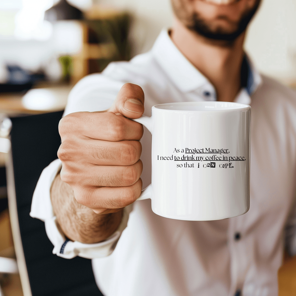 a man is holding a coffee mug in his hand