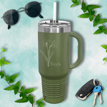 a green travel mug next to a pair of sunglasses and keys