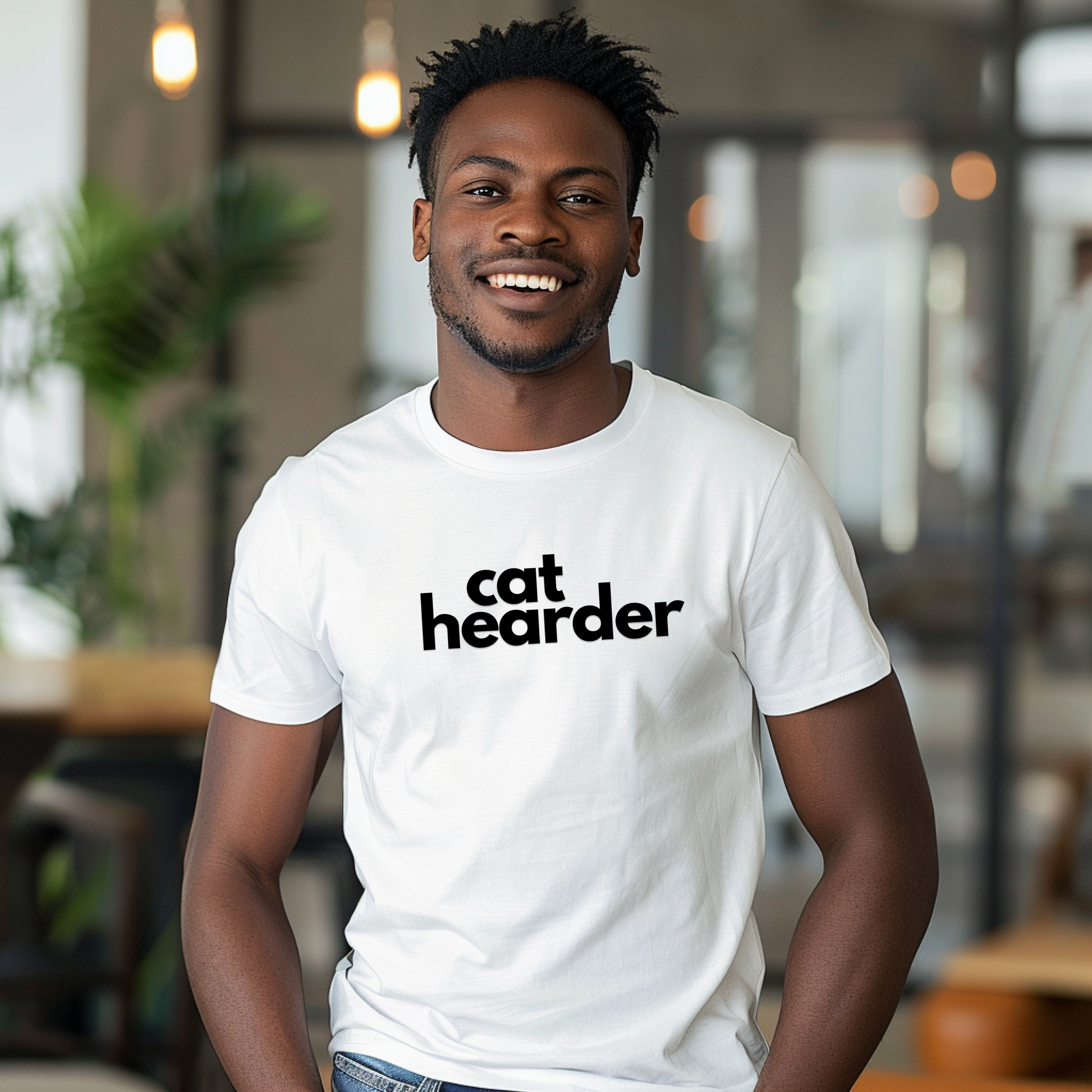 a man wearing a cat headder t - shirt