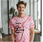 a man wearing a red and white tie dye shirt