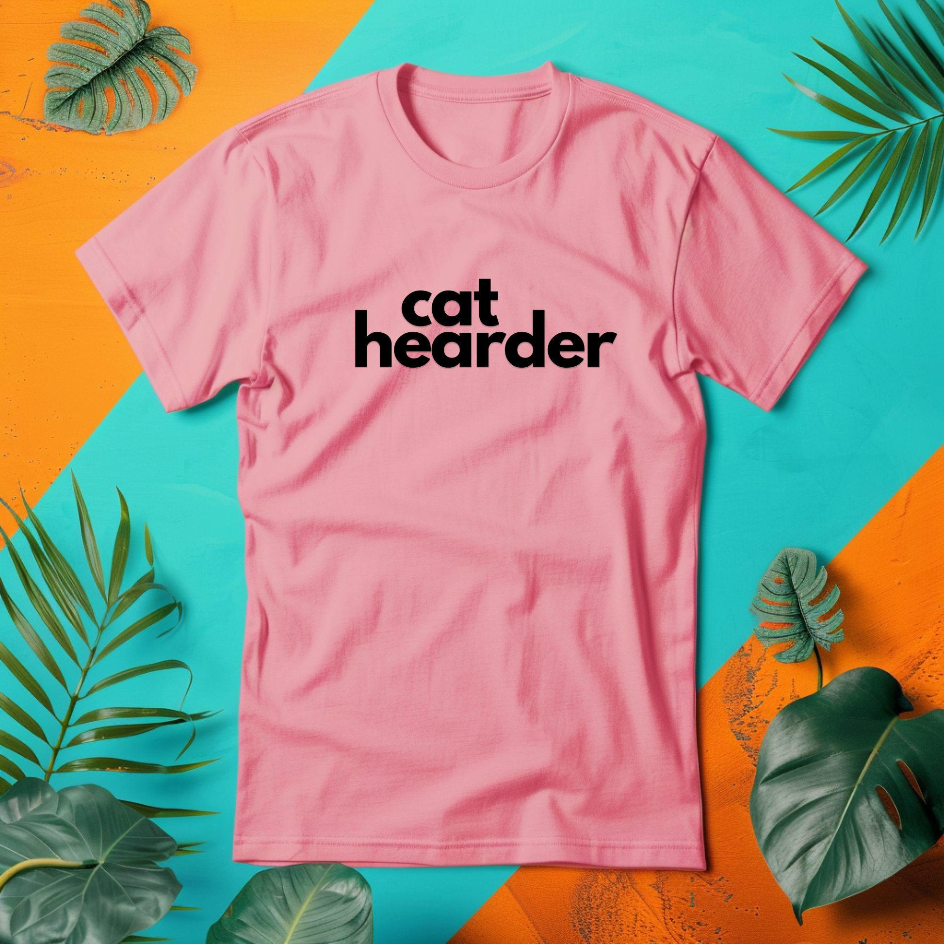 a pink t - shirt with the word cat hearder printed on it