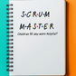 a notebook with the words scrum master written on it