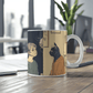 a coffee mug with a picture of a cat and a person