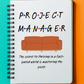 a notebook with the words project manager written on it