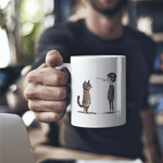 a man holding a coffee mug with a cat on it