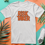 a white t - shirt with the words risk taker on it