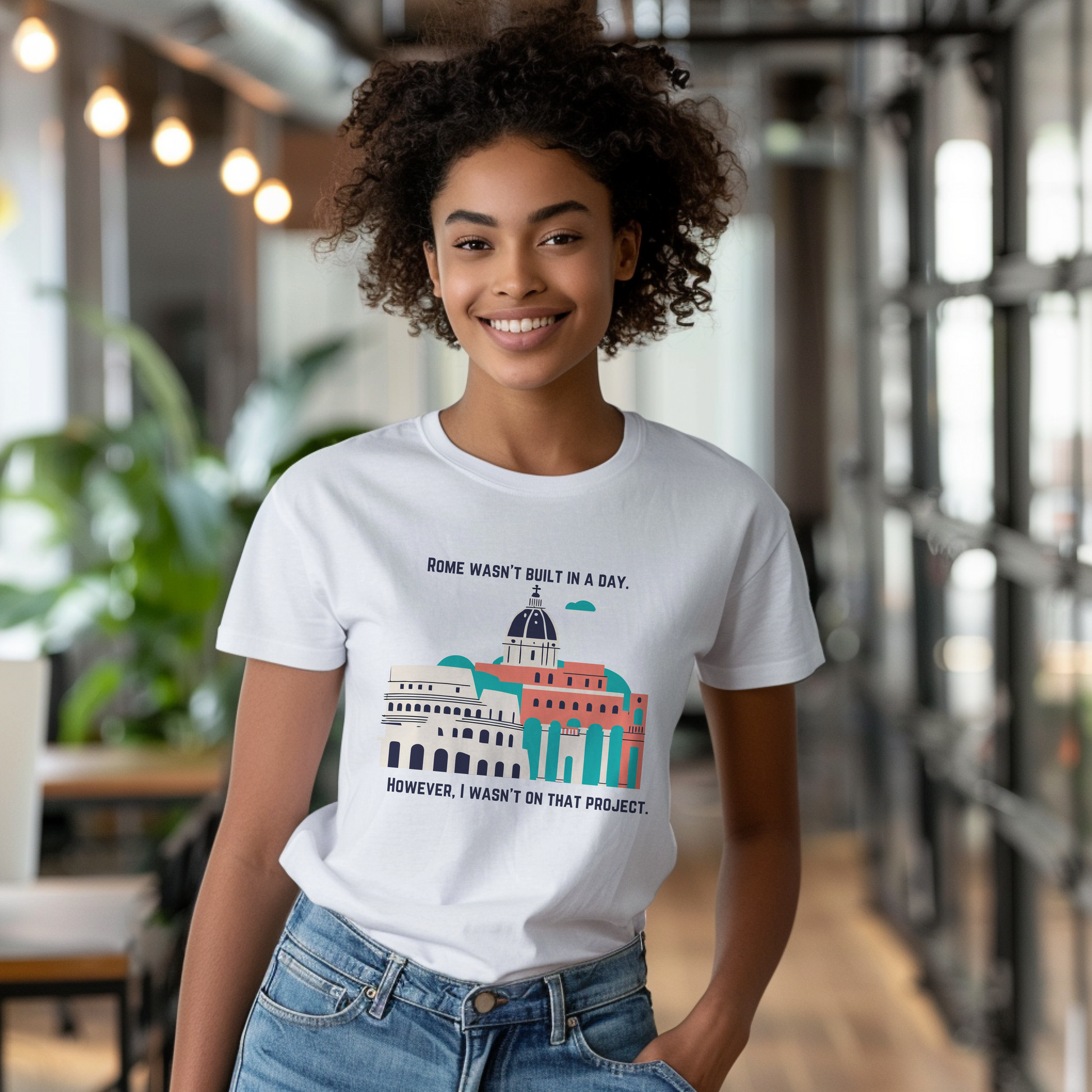 a woman wearing a t - shirt with a picture of a building on it